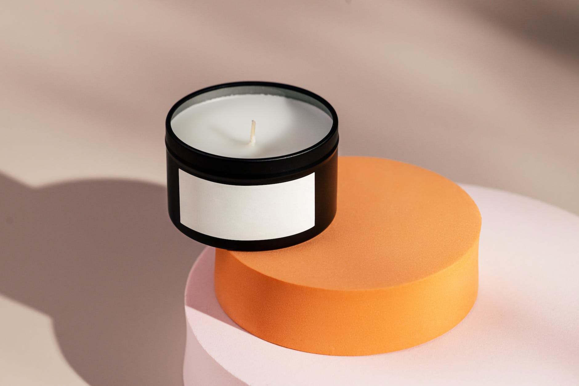 candle in a jar with a blank label