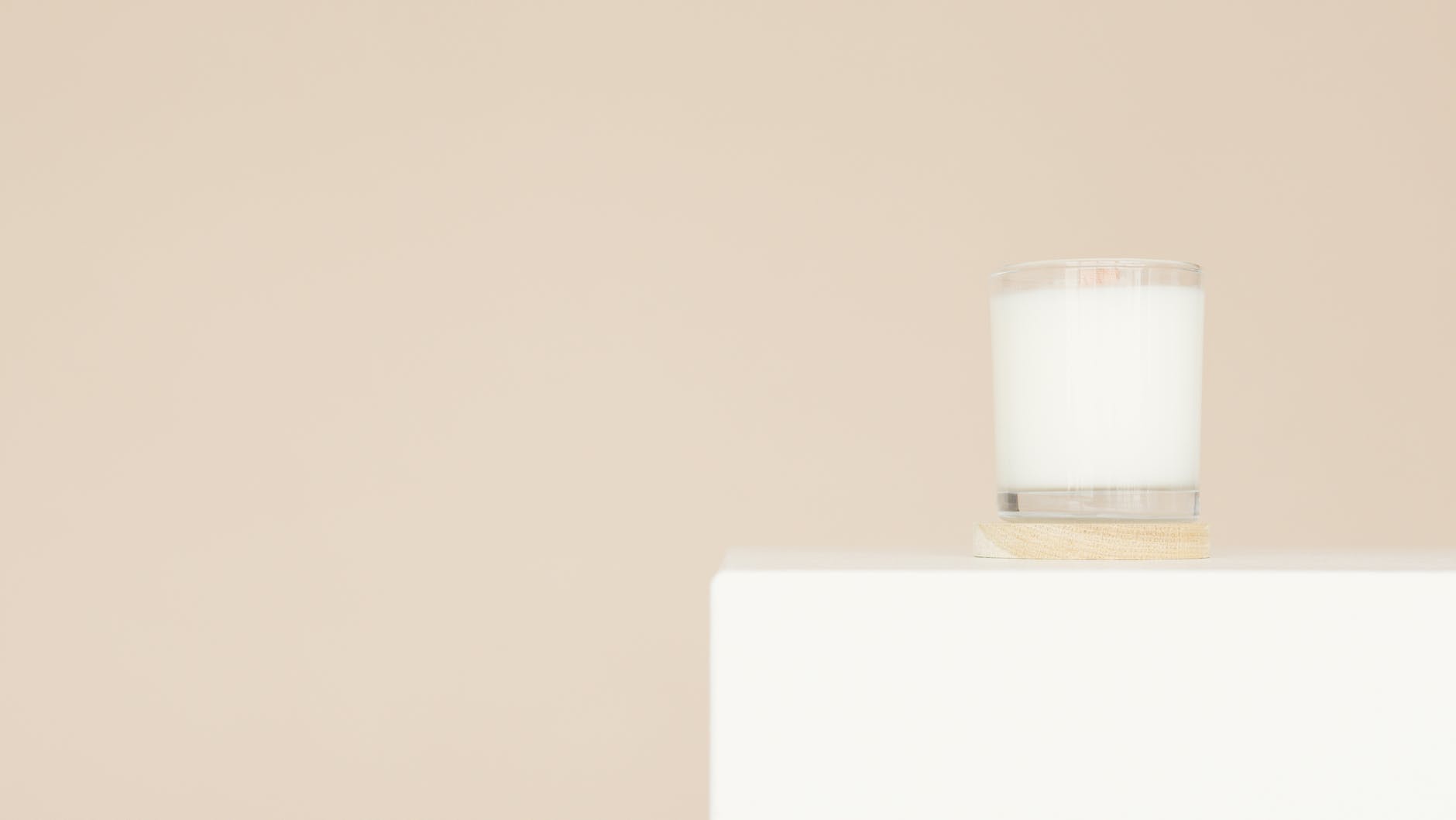 clear drinking glass with white liquid inside